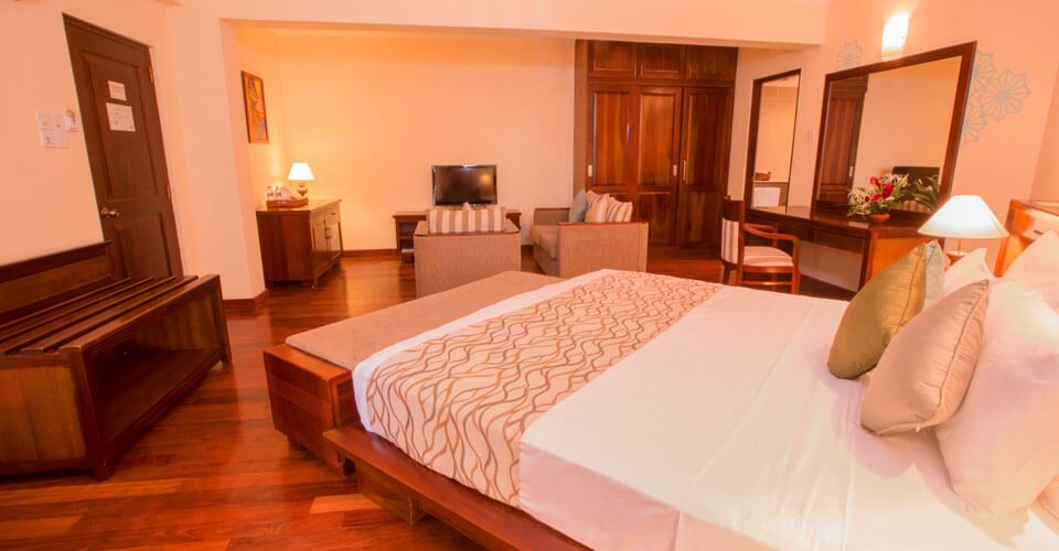 Spacious suite rooms opening to the palm garden at The Palms Hotel, Beruwala