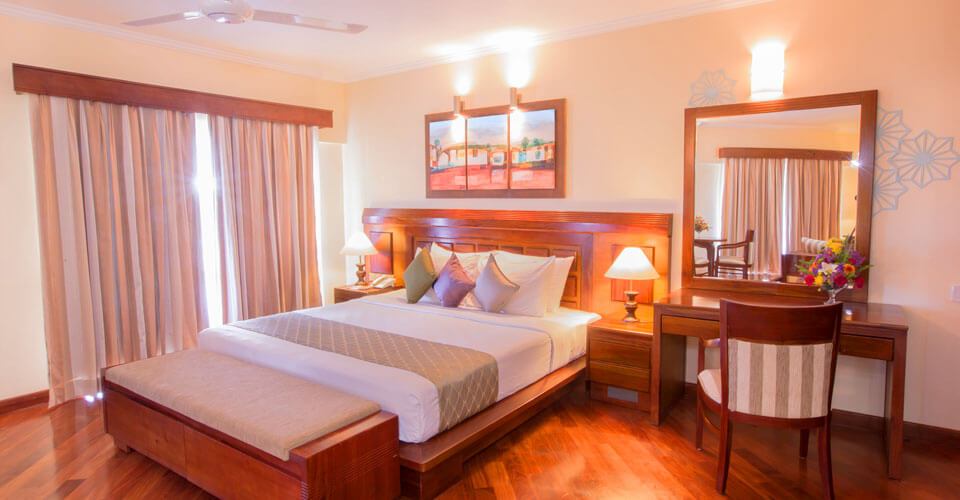 Classical earthly décor of the Sea View Suite Room at The Palms Hotel, Beruwala