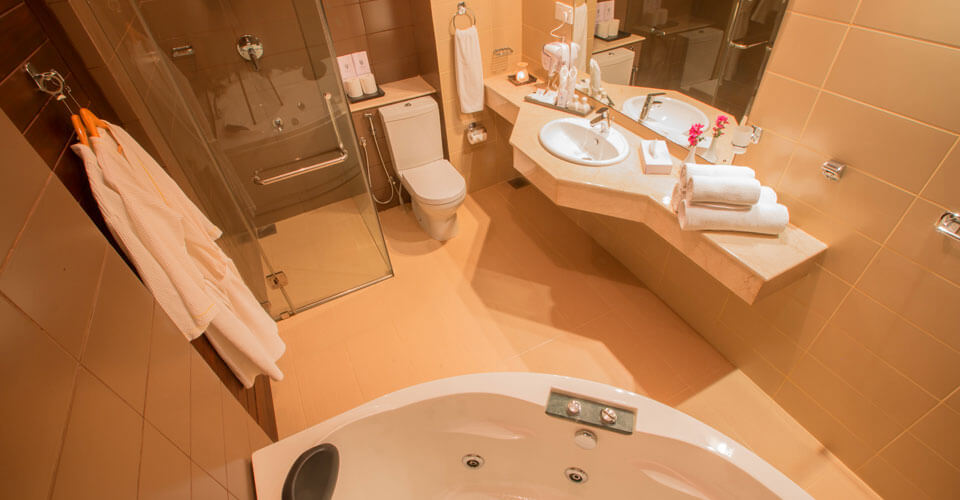 The attached bathroom with hot and cold shower